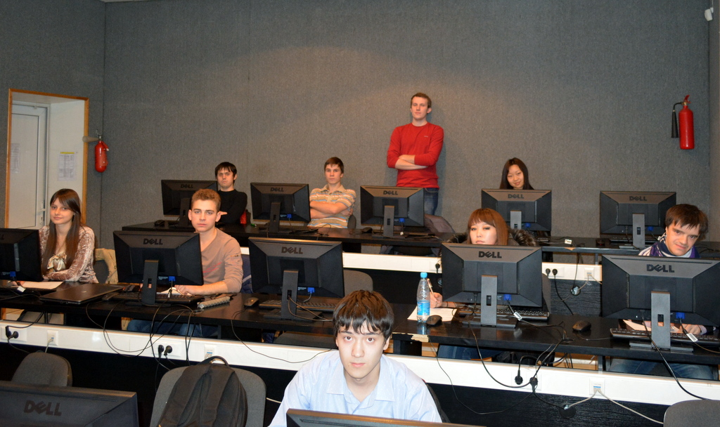 Our iOS Developer Dmitry and his students during the lecture Our iOS Developer Dmitry and his students during the lecture